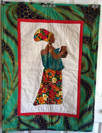 woman-with-child-quilt-1425923551-jpg